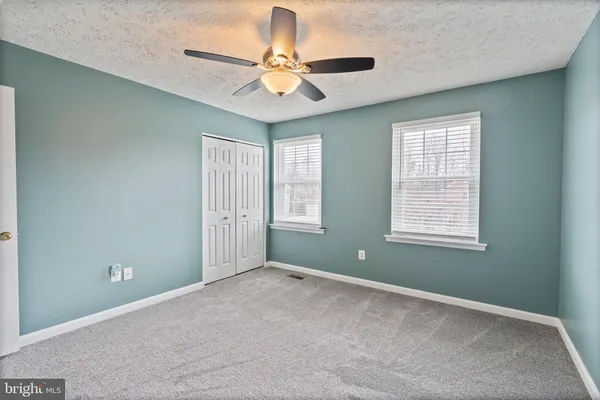 an empty room and window in a room