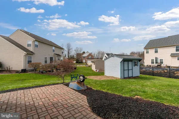 a view of a house with a big yard
