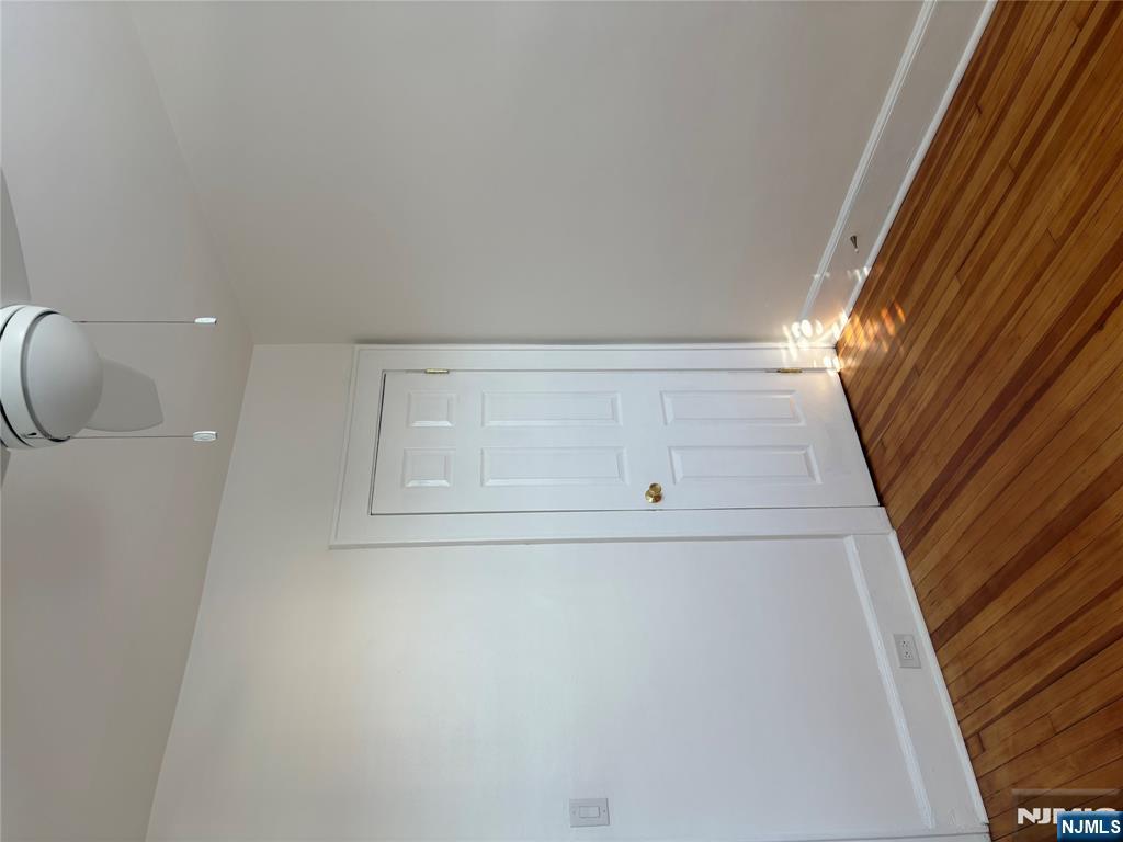761 Hamilton Street, Unit 2 Harrison, NJ 07029 - Photo 11 of 14 a view of room with wooden floor