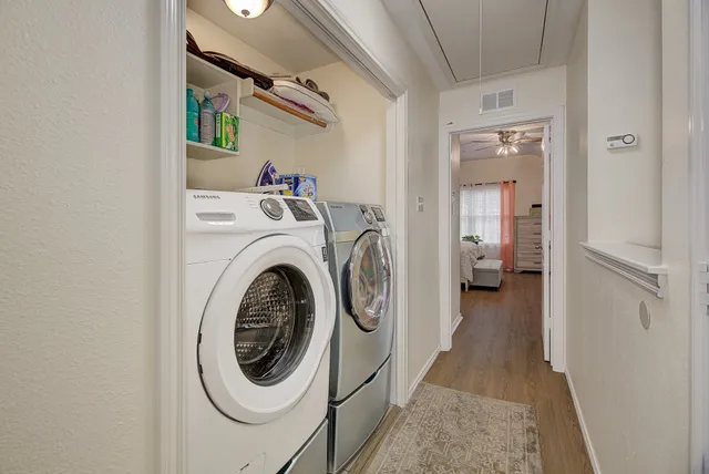 a utility room with dryer and washer