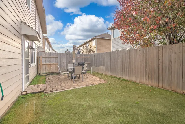 a view of pool with patio