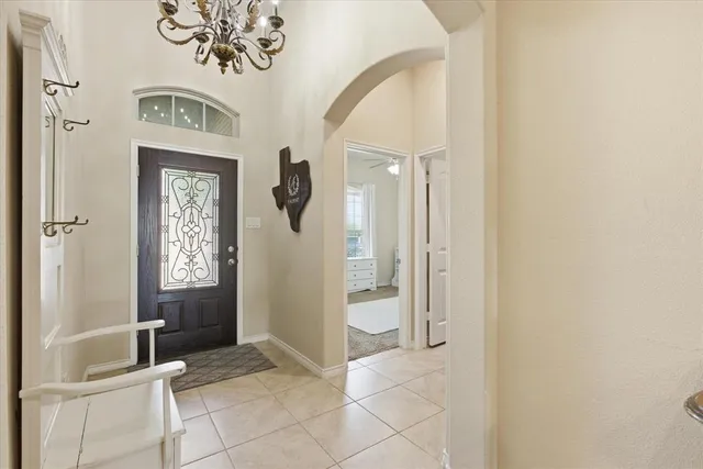 a view of an entryway door front of a house