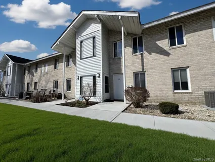 a front view of a house with patio