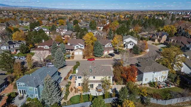 an aerial view of residential building and parking space