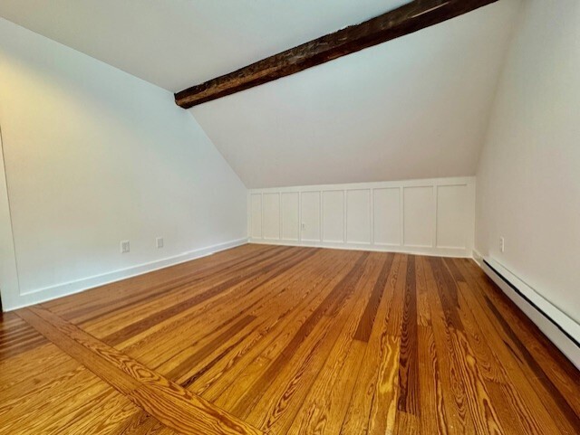 567 Firetown Road Simsbury, CT 06070 - Photo 21 of 39 a view of a room with wooden floor and bench