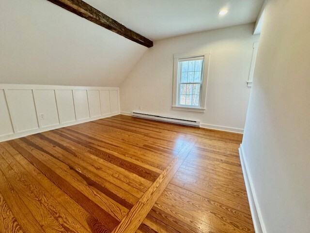 567 Firetown Road Simsbury, CT 06070 - Photo 22 of 39 a view of a room with wooden floor and white walls