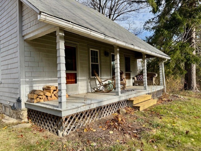 567 Firetown Road Simsbury, CT 06070 - Photo 27 of 39 a view of a dinning room with balcony