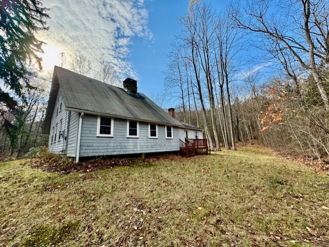 567 Firetown Road Simsbury, CT 06070 - Photo 32 of 39 a house that has a tree in front of it