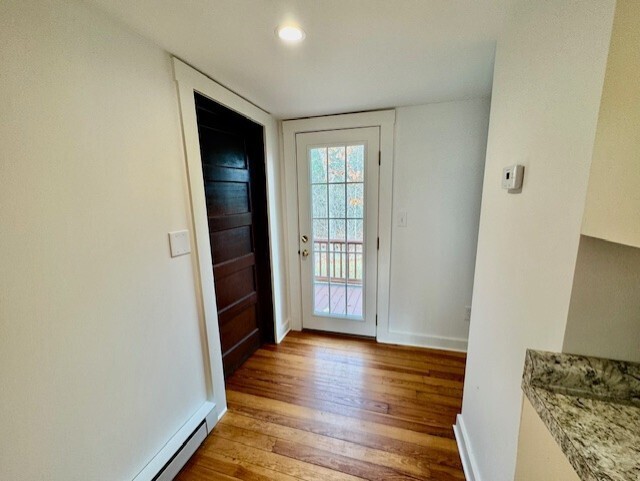 567 Firetown Road Simsbury, CT 06070 - Photo 9 of 39 a view of a room with wooden floor and a window