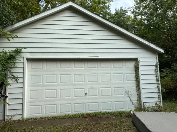 a small white building with a outdoor space