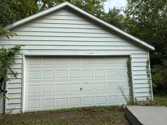 a small white building with a outdoor space