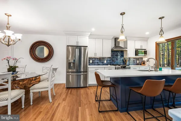 a view of a dining room and chandelier