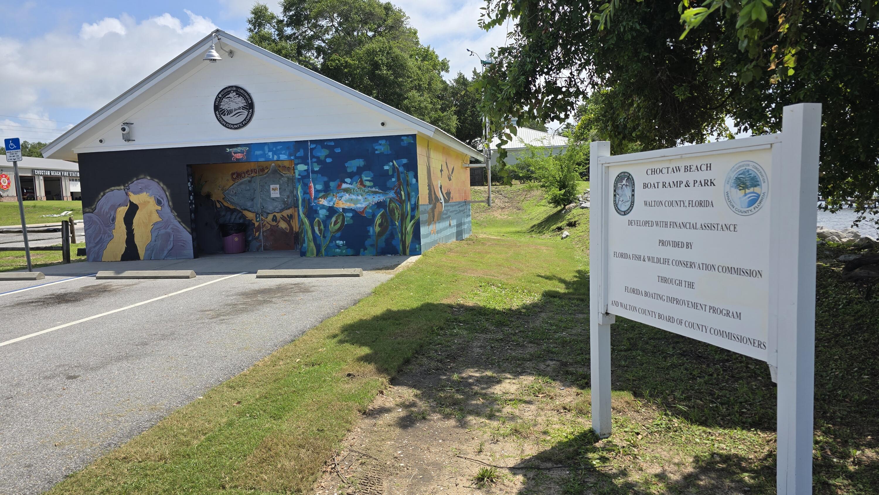 Lot 29 West State Highway Freeport, FL 32439 - Photo 17 of 17 a front view of a house with a yard and garage