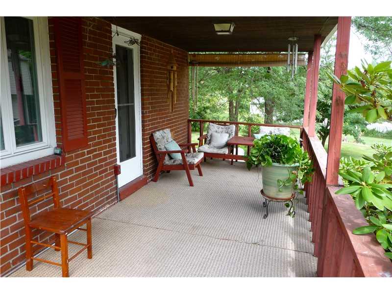 21 Kennedy Lane McKees Rocks, PA 15136 - Photo 16 of 16 Patio/Deck. Side Porch off Kitchen and Dining area