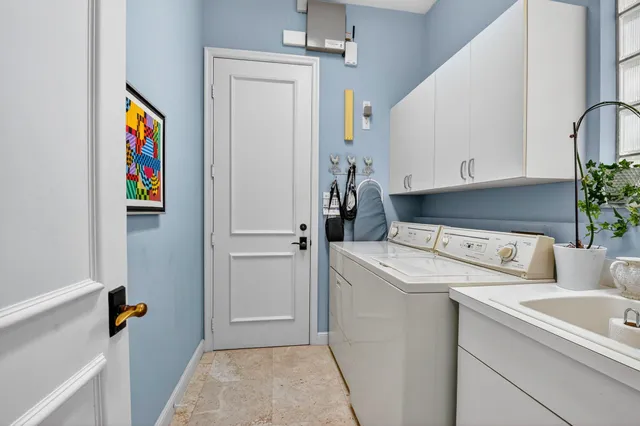 a bathroom with a granite countertop shower a sink and a mirror