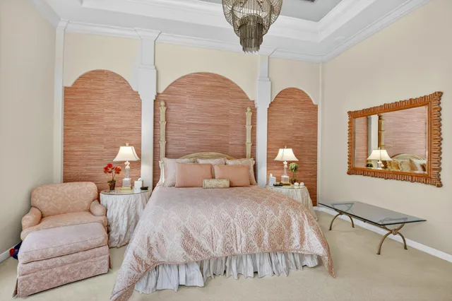 a view of a lake with houses in the background