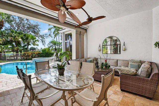 a view of a chairs and tables in patio