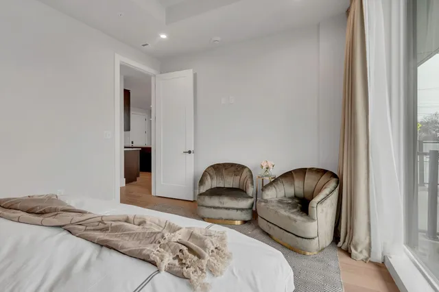 a bathroom with a double vanity sink and mirror