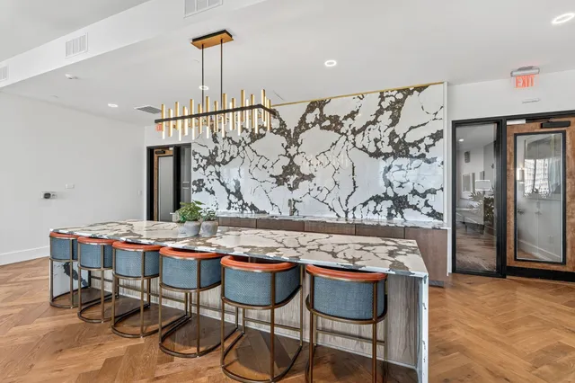 a view of a backyard with sitting area