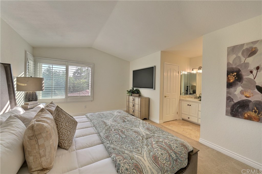 19271 Kamlyn Lane Walnut, CA 91789 - Photo 16 of 29 a bedroom with a bed and large windows