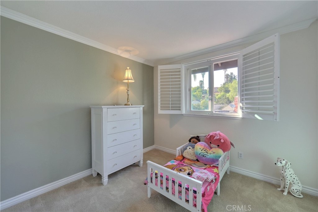 19271 Kamlyn Lane Walnut, CA 91789 - Photo 18 of 29 a bedroom with furniture and a window