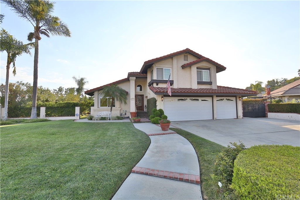 19271 Kamlyn Lane Walnut, CA 91789 - Photo 2 of 29 a front view of house with yard and seating area