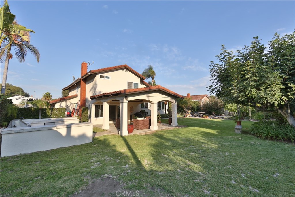 19271 Kamlyn Lane Walnut, CA 91789 - Photo 29 of 29 a view of a house with a big yard and large trees