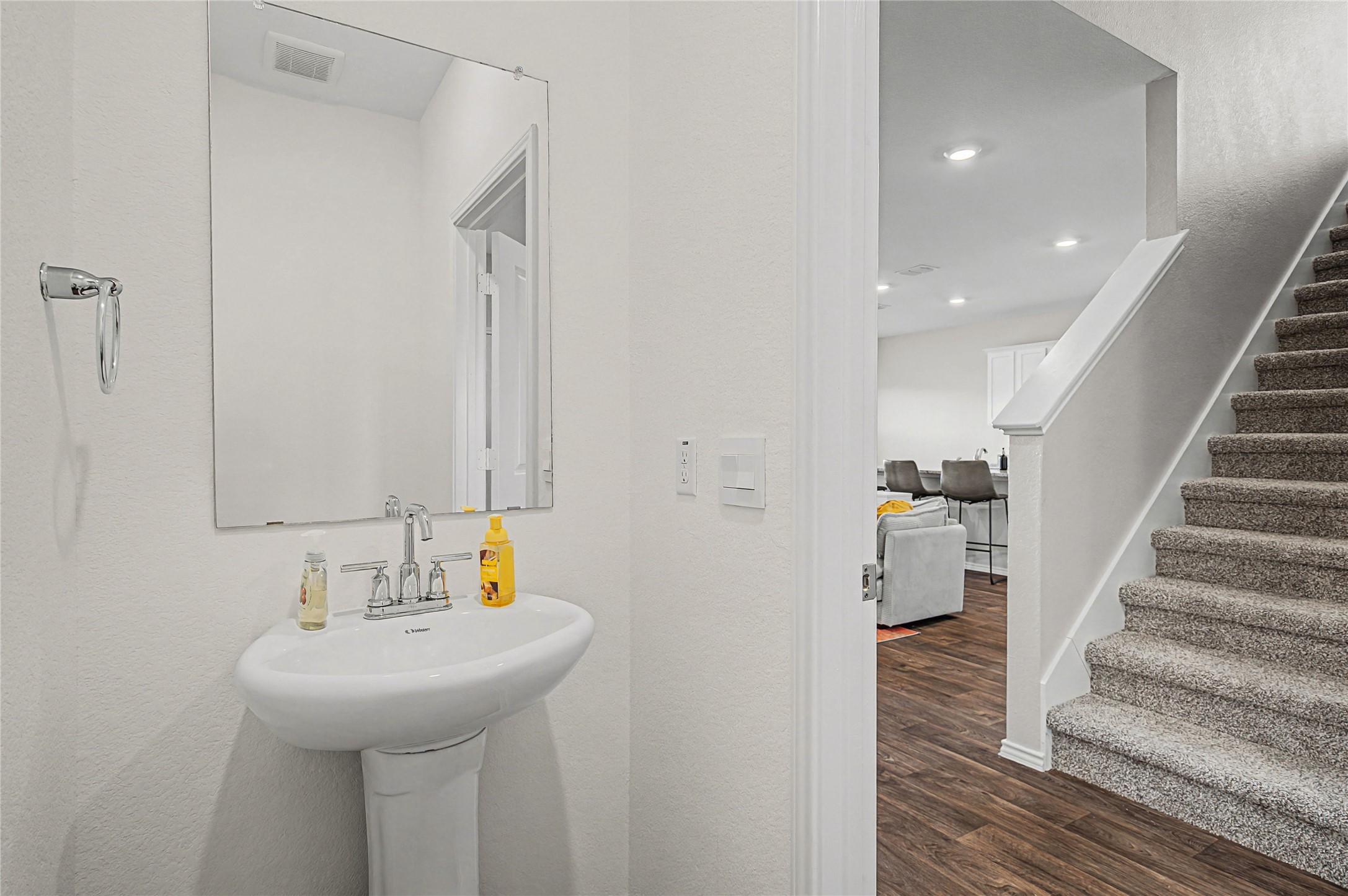 18517 Cremello Dr Manor, Unit B Manor, TX 78653 - Photo 8 of 16 a bathroom with a sink and a mirror