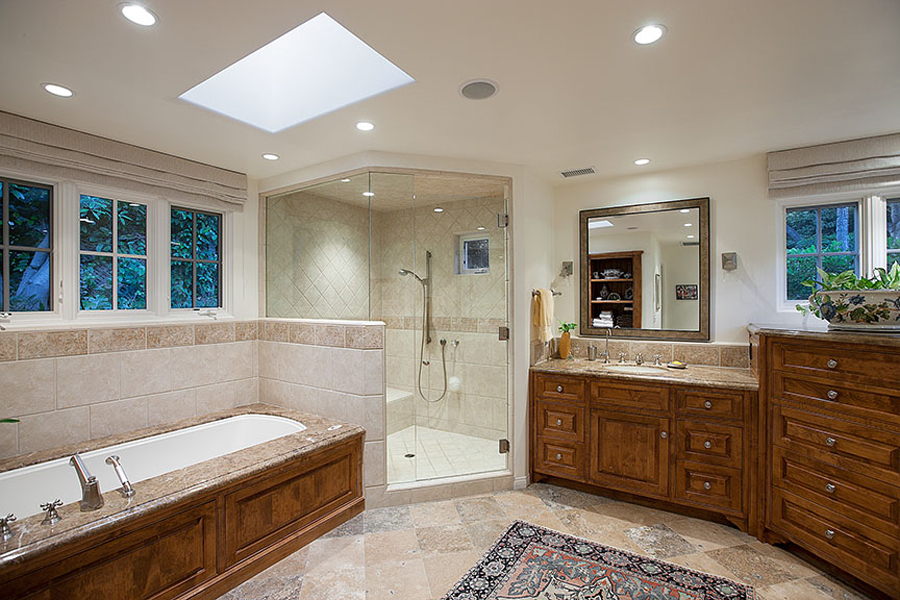 2140 Veloz Drive Montecito, CA 93108 - Photo 7 of 16 a bathroom with a tub sink and mirror