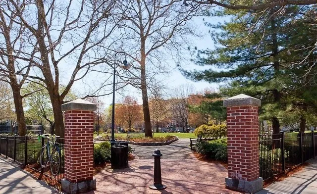 a view of a patio with a yard
