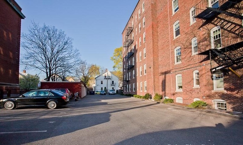 55 Magazine Street, Unit 23 Cambridge, MA 02139 - Photo 14 of 14 a car parked in front of a building