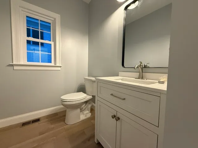 a view of a hallway with staircase