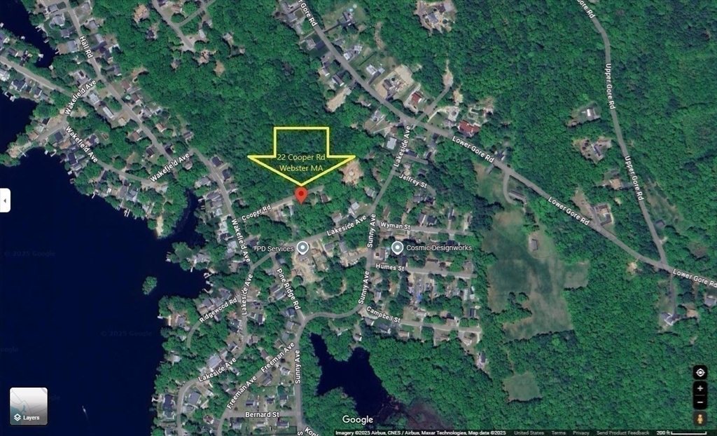 24 Cooper Road Webster, MA 01570 - Photo 42 of 42 a green field with lots of trees in it