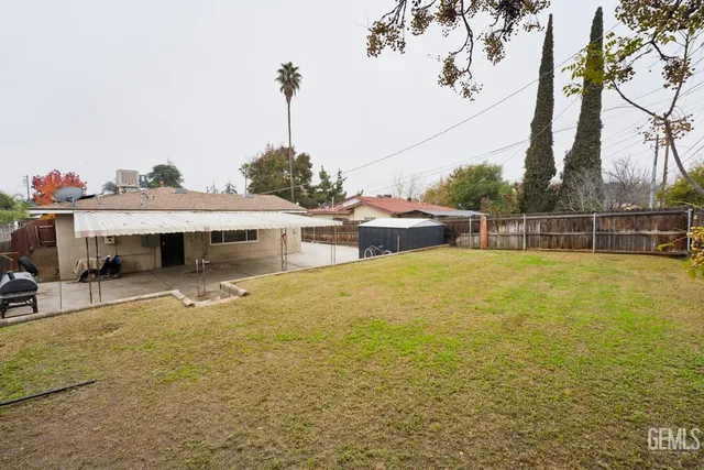 a terrace with outdoor seating and city view