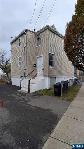 a front view of house with yard