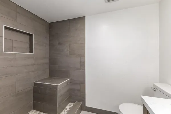 a bathroom with a sink and a toilet