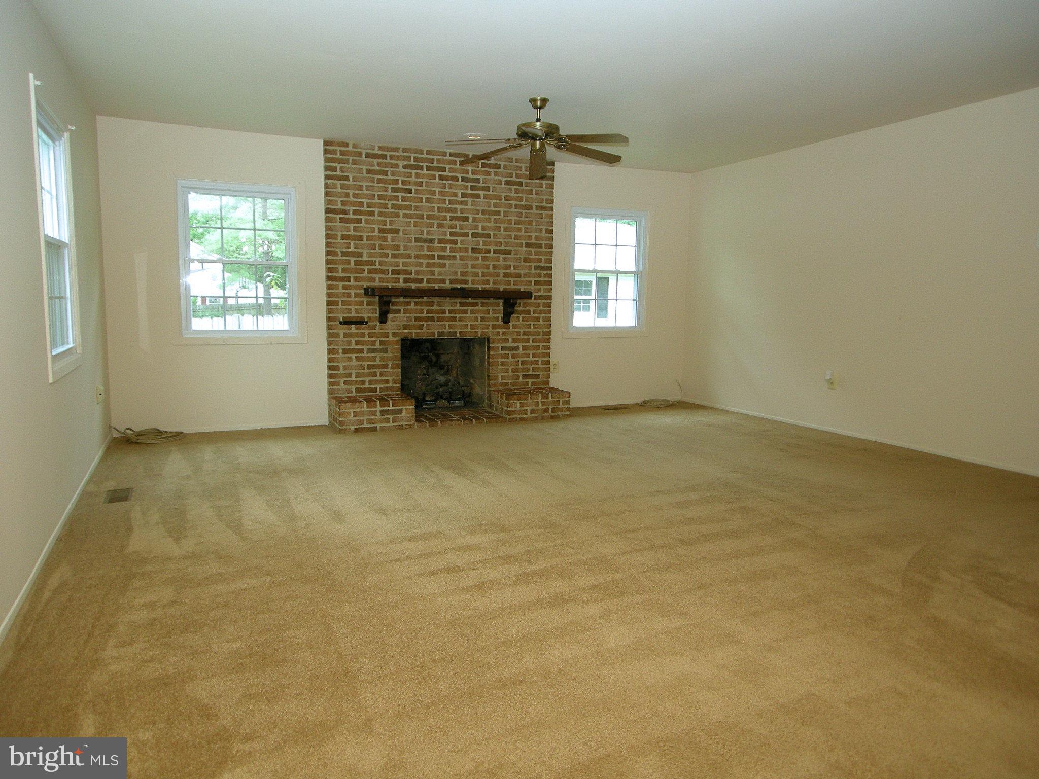 12800 Silverbirch Lane Laurel, MD 20708 - Photo 4 of 22 Living Room with gas fireplace