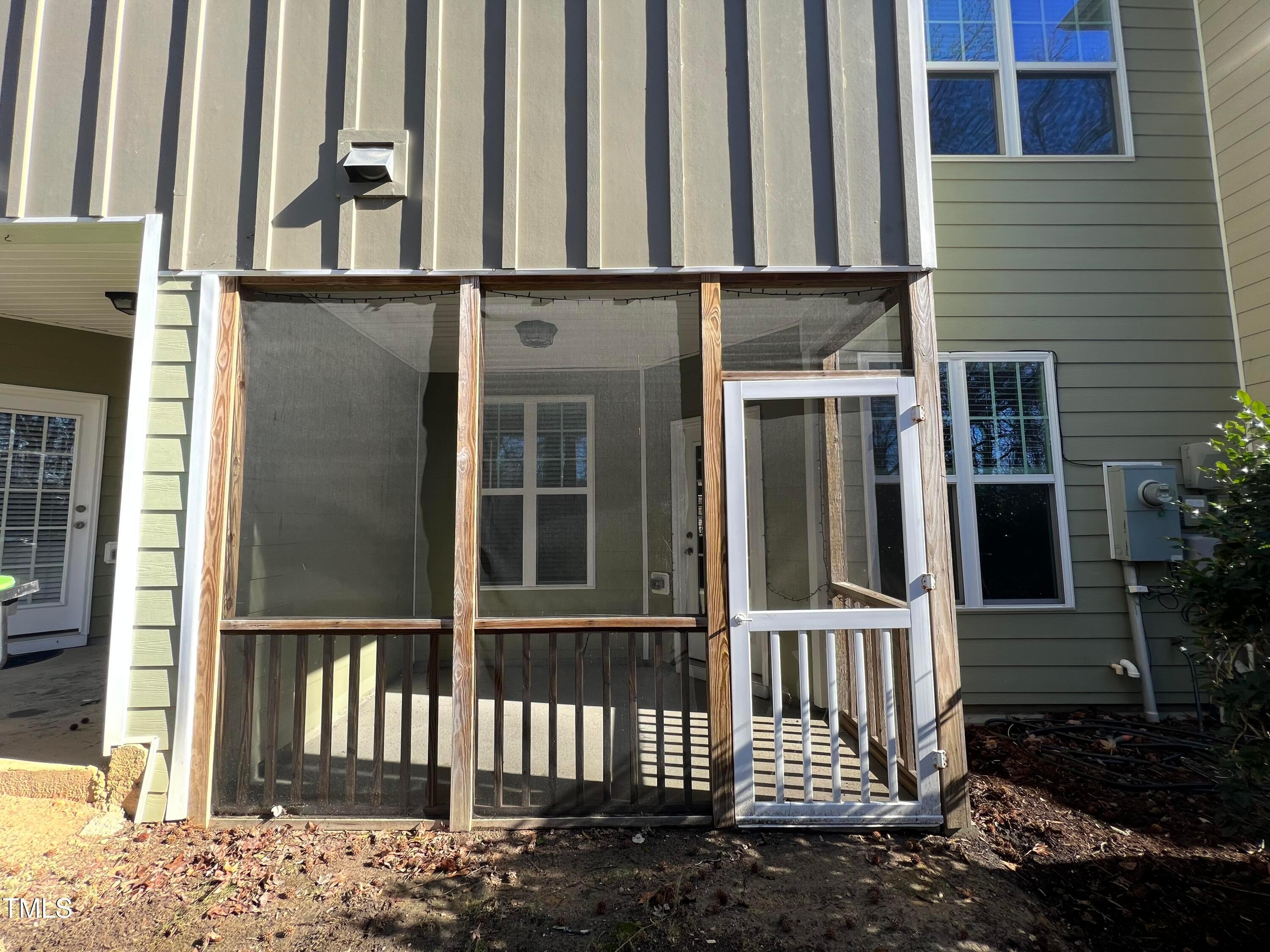 714 Treviso Lane Apex, NC 27502 - Photo 3 of 27 a view of a house with a small porch