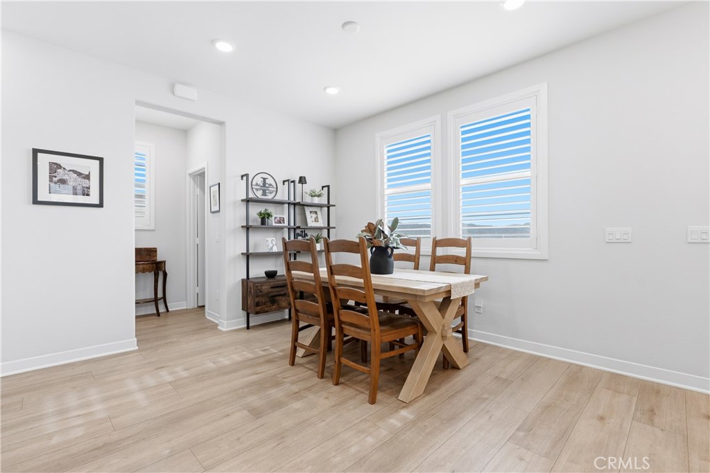 75 Gander Court Rancho Mission Viejo, CA 92694 - Photo 13 of 75 a view of a dining room with furniture and wooden floor