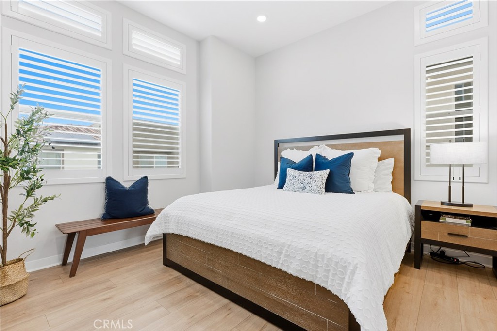 75 Gander Court Rancho Mission Viejo, CA 92694 - Photo 18 of 75 a bedroom with a bed and a potted plant