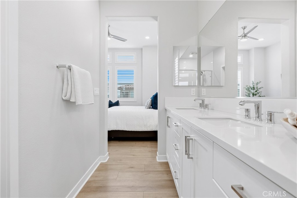 75 Gander Court Rancho Mission Viejo, CA 92694 - Photo 27 of 75 a en suite bathroom with a double vanity sink and mirror