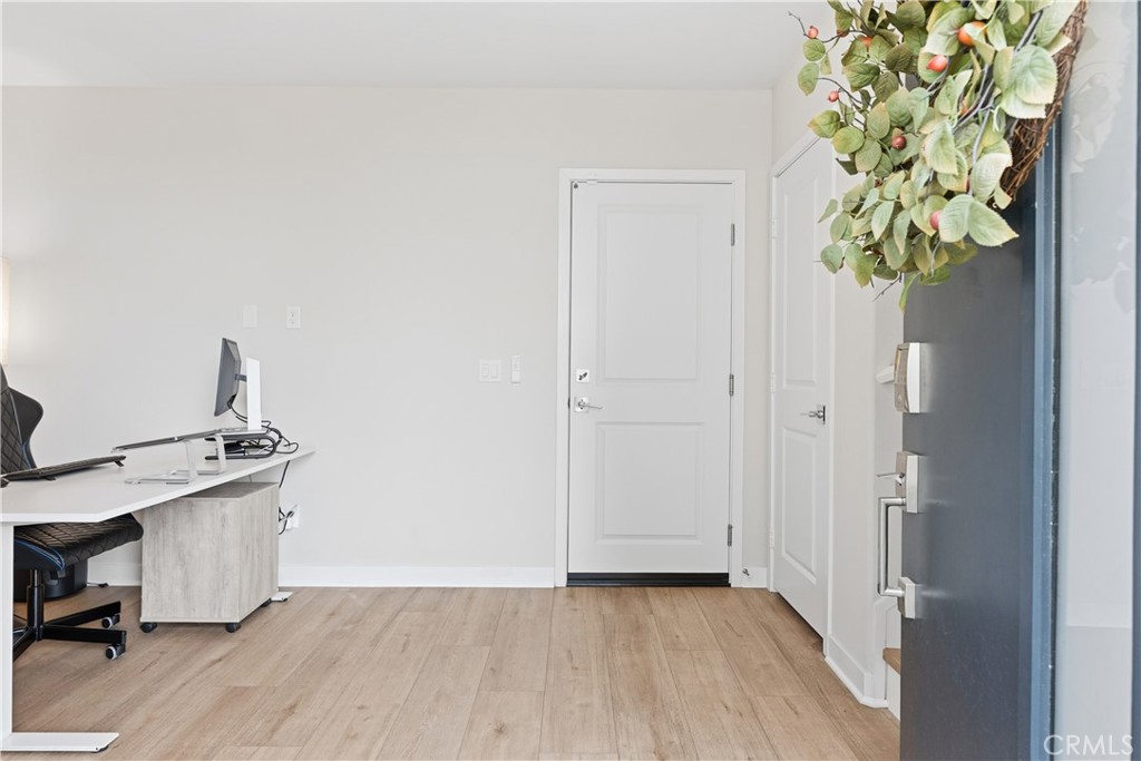 75 Gander Court Rancho Mission Viejo, CA 92694 - Photo 28 of 75 a view of a hallway with wooden floor