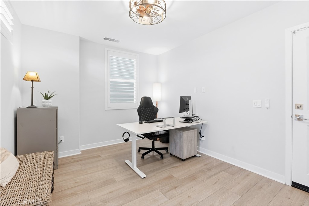 75 Gander Court Rancho Mission Viejo, CA 92694 - Photo 29 of 75 a view of a workspace with furniture and a window
