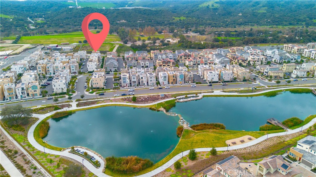 75 Gander Court Rancho Mission Viejo, CA 92694 - Photo 39 of 75 a view of a swimming pool with a lake view