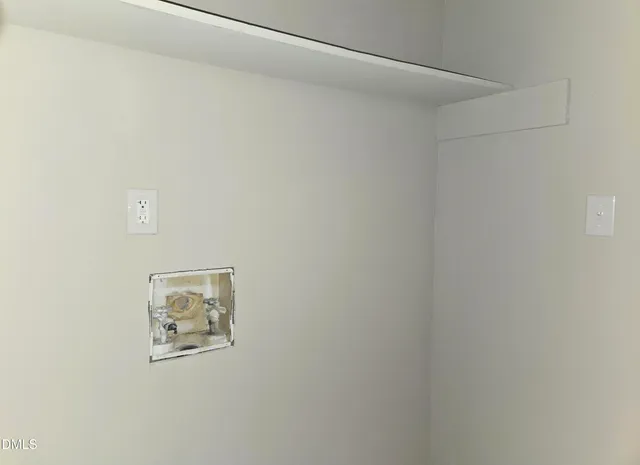 a view of a bathroom from a hallway