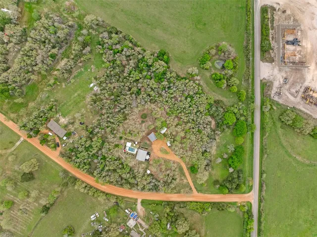 a view of a garden from a balcony