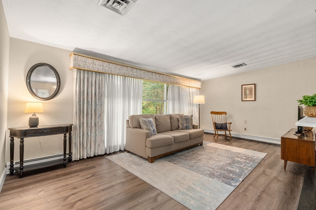 14 Corrine Drive Framingham, MA 01701 - Photo 2 of 15 a living room with furniture and a window