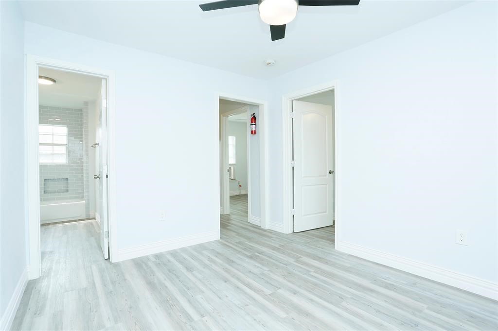 3603 Bastrop Street, Unit 4 Houston, TX 77004 - Photo 2 of 10 an empty room with wooden floor and closet