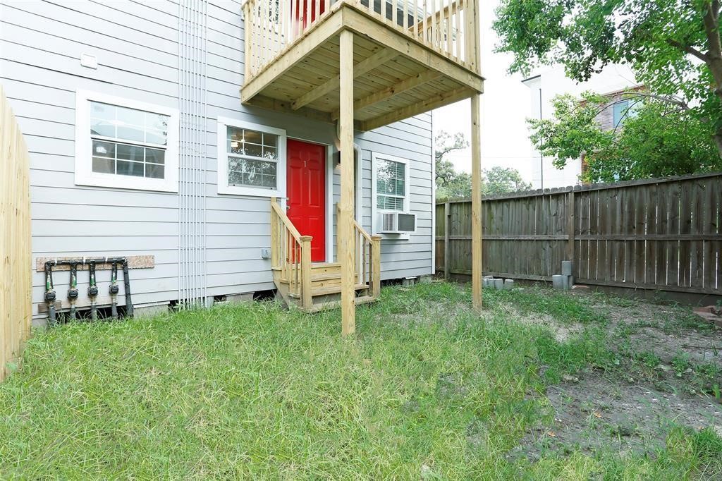 3603 Bastrop Street, Unit 4 Houston, TX 77004 - Photo 10 of 10 a view of a chair and table in backyard of the house
