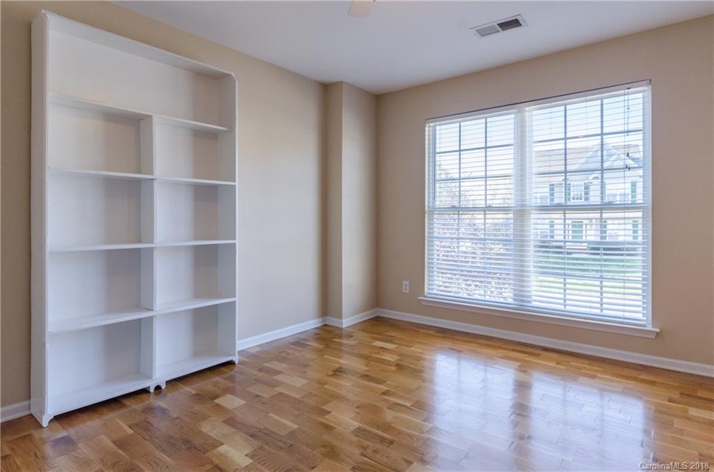 4100 Desert Rose Court Fort Mill, SC 29708 - Photo 22 of 33 a view of an empty room with a window and wooden floor